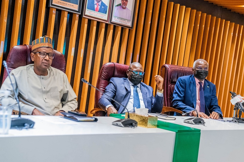 Hon. Minister of Works and Housing, Mr. Babatunde Fashola, SAN (right), Executive Chairman, Federal Inland Revenue Service (FIRS), Mr. Muhammad Nami (middle),  and Representative of the Group Managing Director and Chief Finance Officer of the Nigerian National Petroleum Company Limited (NNPCL), Mr Umar Ajiya (left) during the Press Briefing on the 44  Critical Roads Funded by the NNPC through the Road Infrastructure Development and Refurbishment Tax Credit Scheme (Phase II) at the Conference Hall of the Ministry of Works and Housing Headquarters, Mabushi, Abuja on Tuesday, 31st January 2023.
